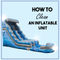 How to clean an inflatable unit, featuring a blue water slide.